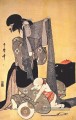 femmes faisant des robes Kitagawa Utamaro japonais